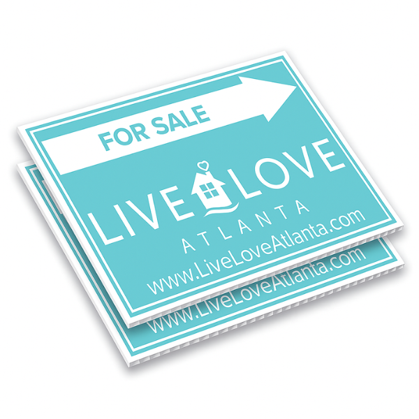 Stack of durable 4mm custom coroplast signs designed for real estate, business advertising, and outdoor promotions.