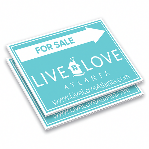 Stack of durable 4mm custom coroplast signs designed for real estate, business advertising, and outdoor promotions.